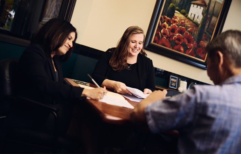 Attorneys working with client