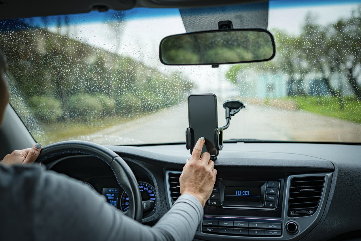 Rideshare Driver using their phone while driving instead of looking at the road