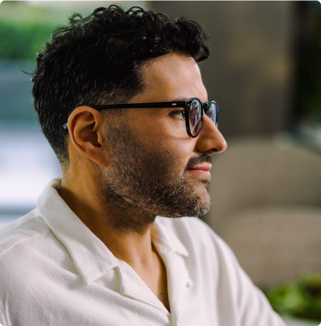 Side-view of a man with glasses