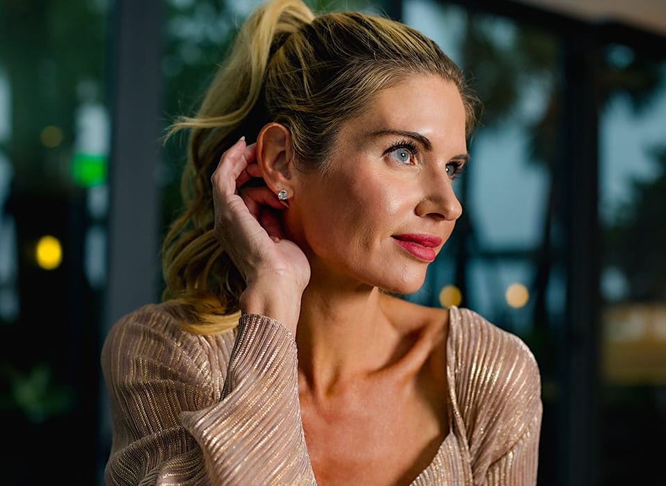 woman with high ponytail getting hit by the sun