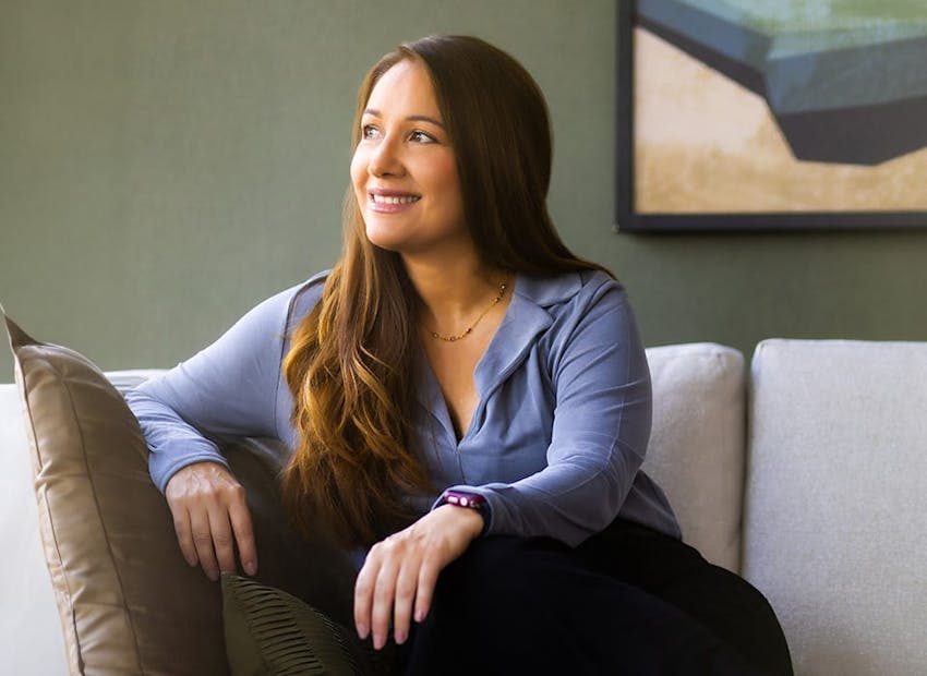 woman sitting on couch