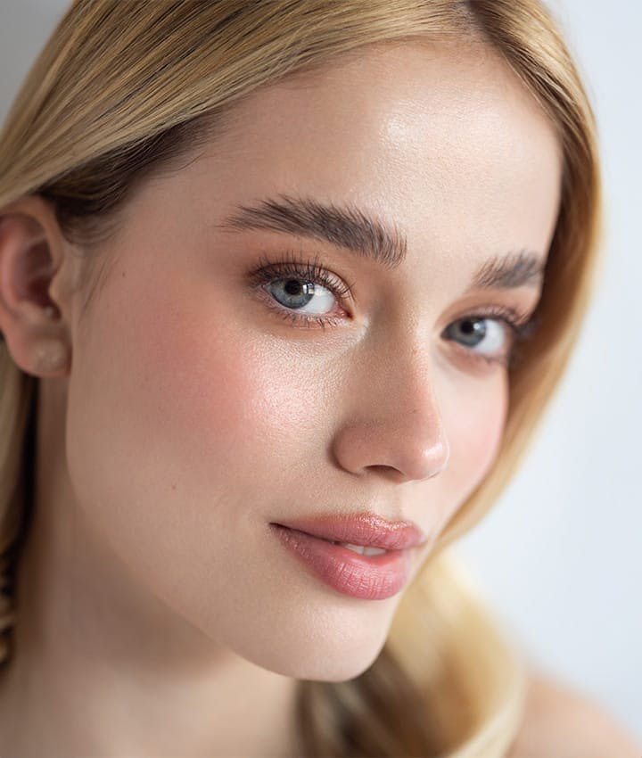 close up of woman with blue eyes