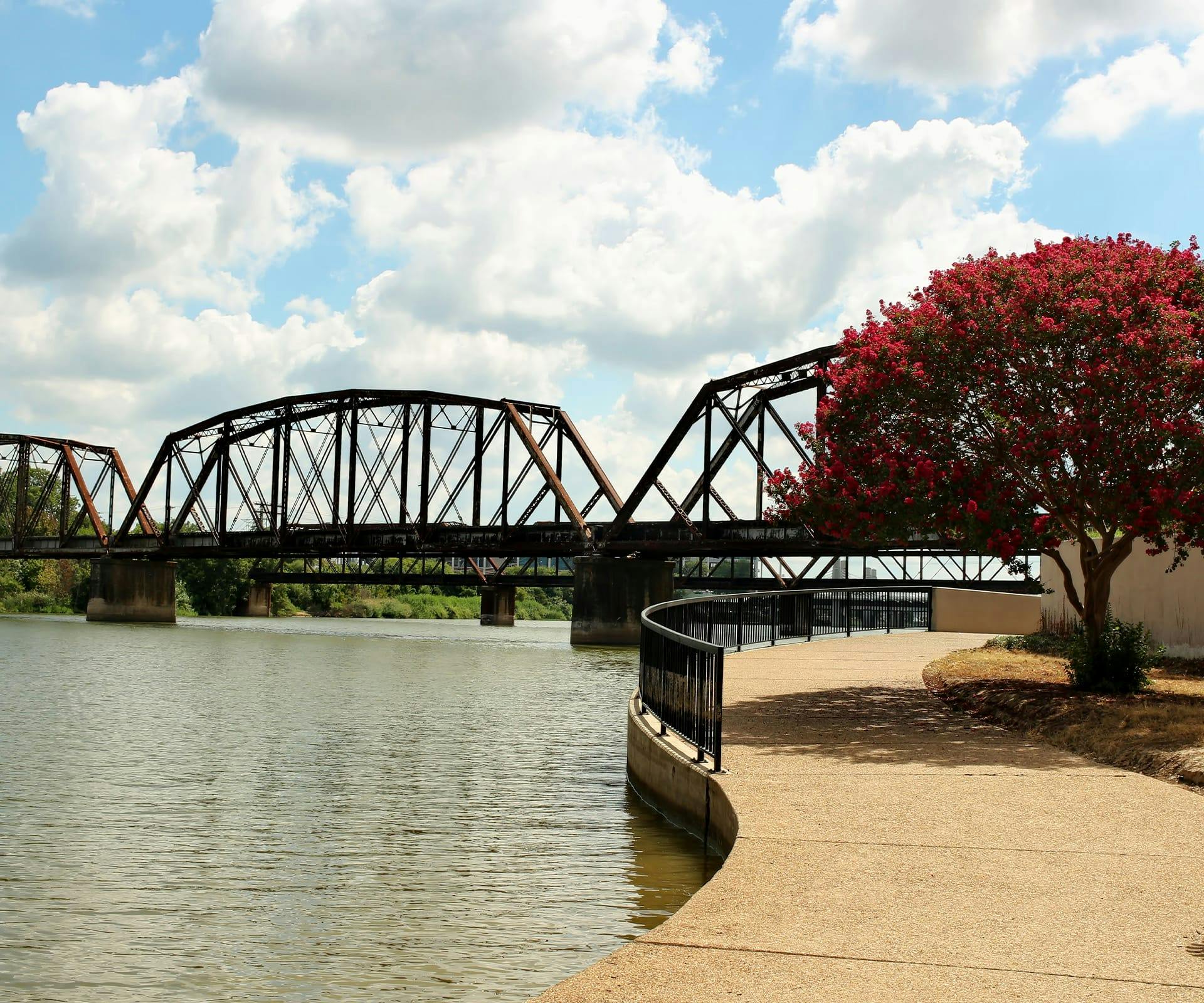 lake with bridge with walk way around the lake