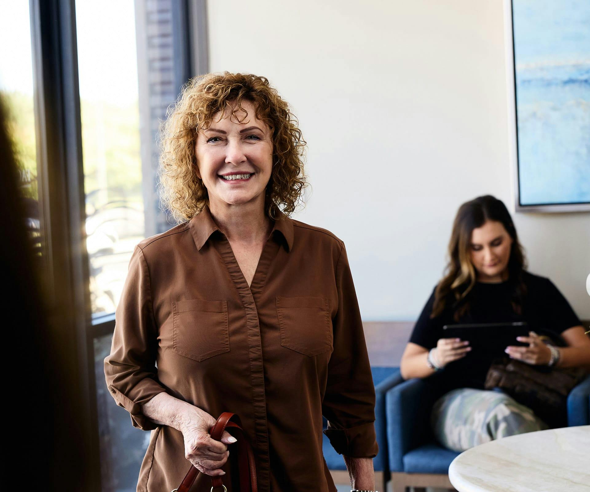 woman smiling in waiting room