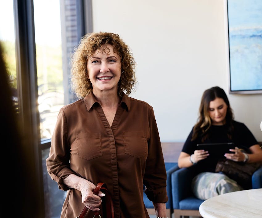 woman smiling in waiting room