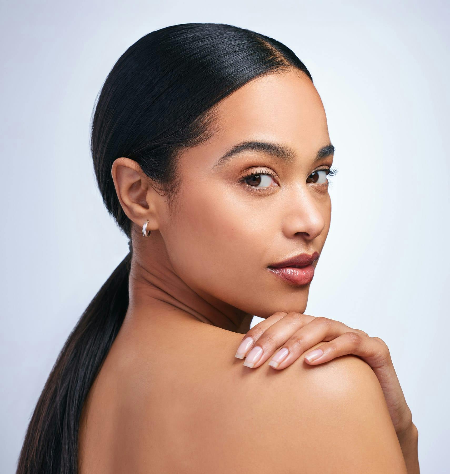 woman looking back over her shoulder