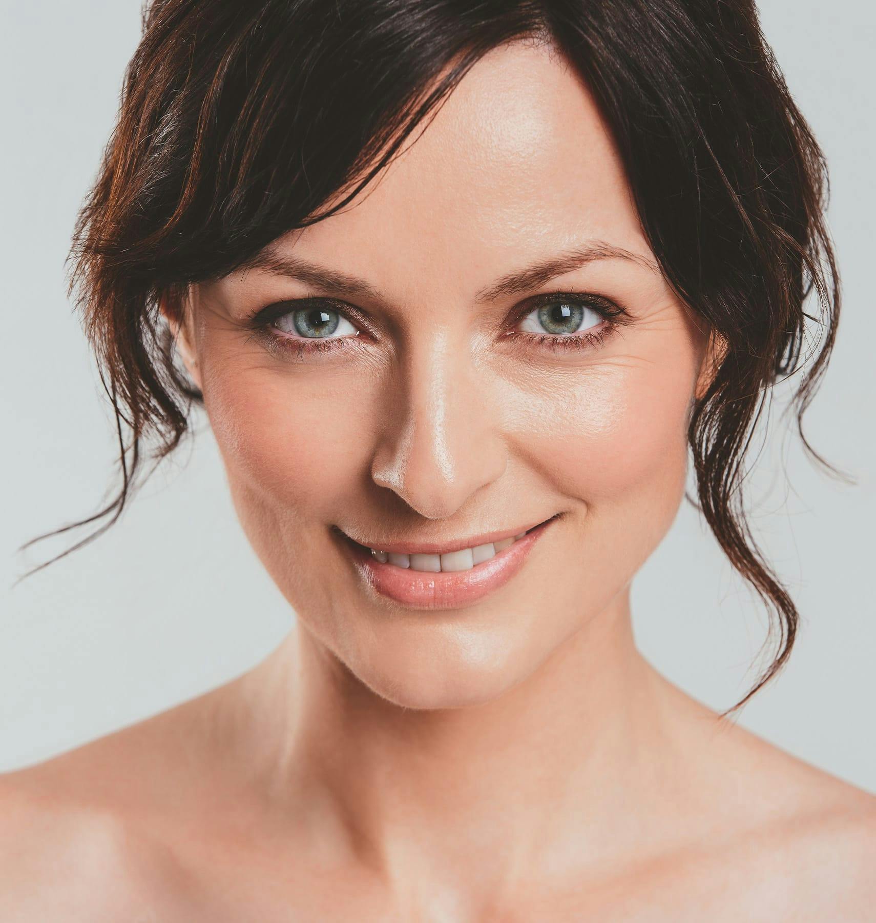 woman smiling forward
