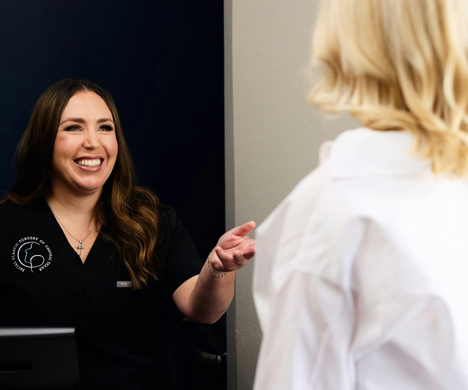 Staff member greeting patient