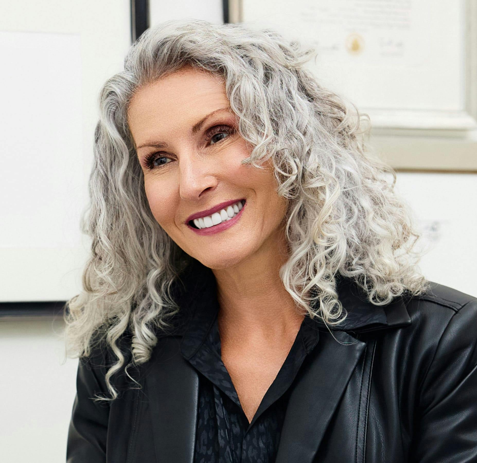 woman with grey curly hair