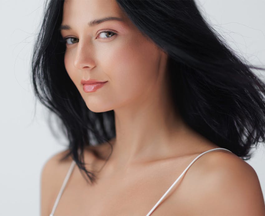 Smiling woman with dark hair