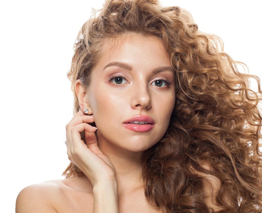 Woman with long curly hair