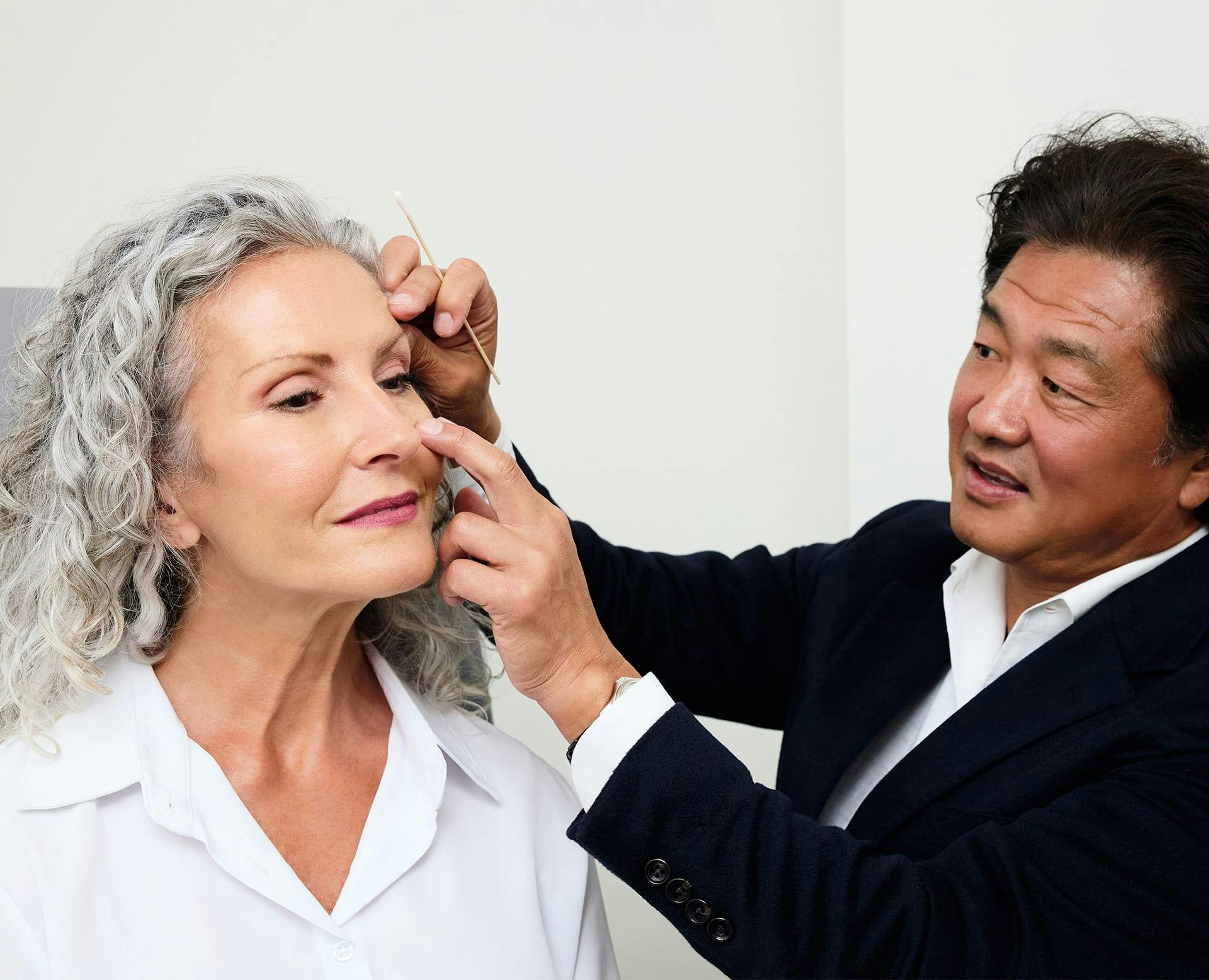 Dr. Min S. Ahn with a female patient