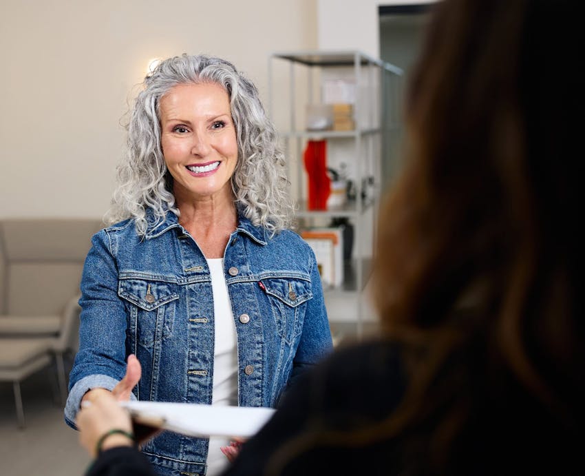 woman with grey curly hair