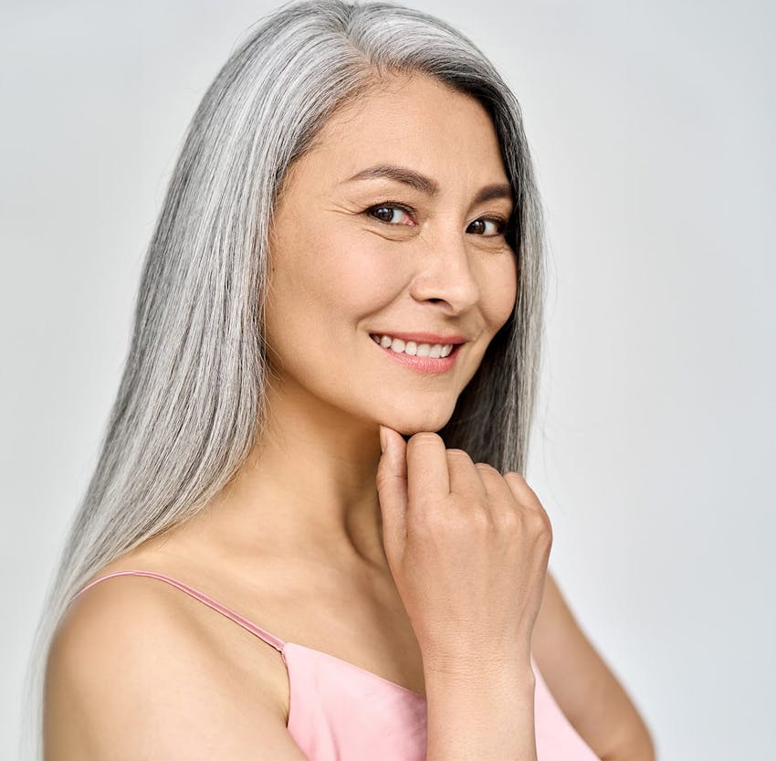 Woman with long grey hair