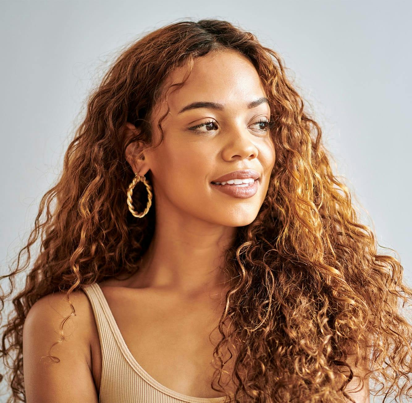 Woman with long curly hair