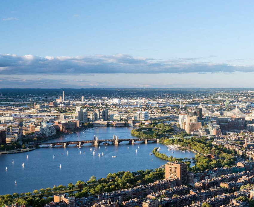Blonde woman writing on clipboard