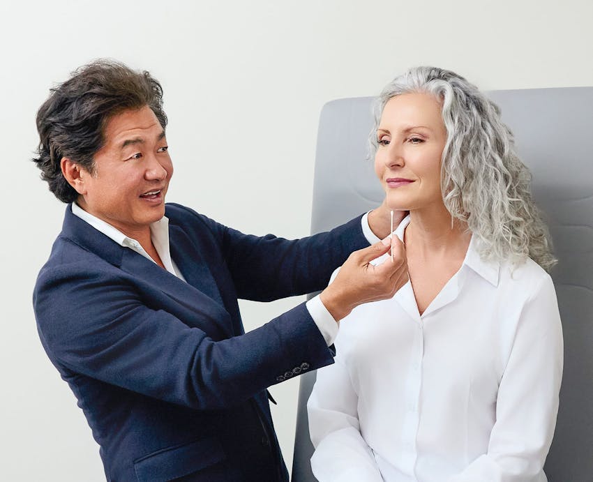 Dr. Min Ahn with patient