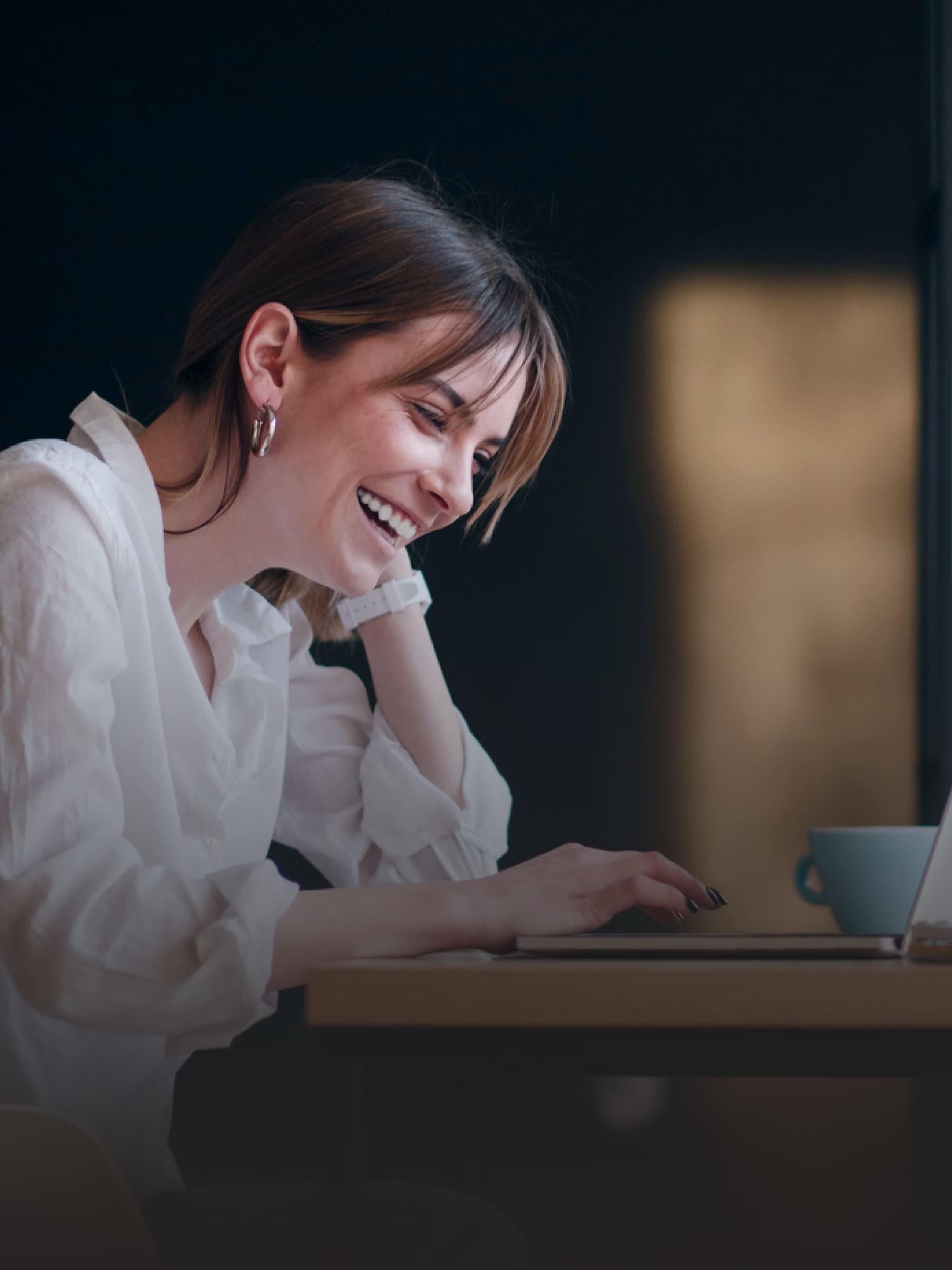 Woman with Laptop- FXPay | OrthoFX