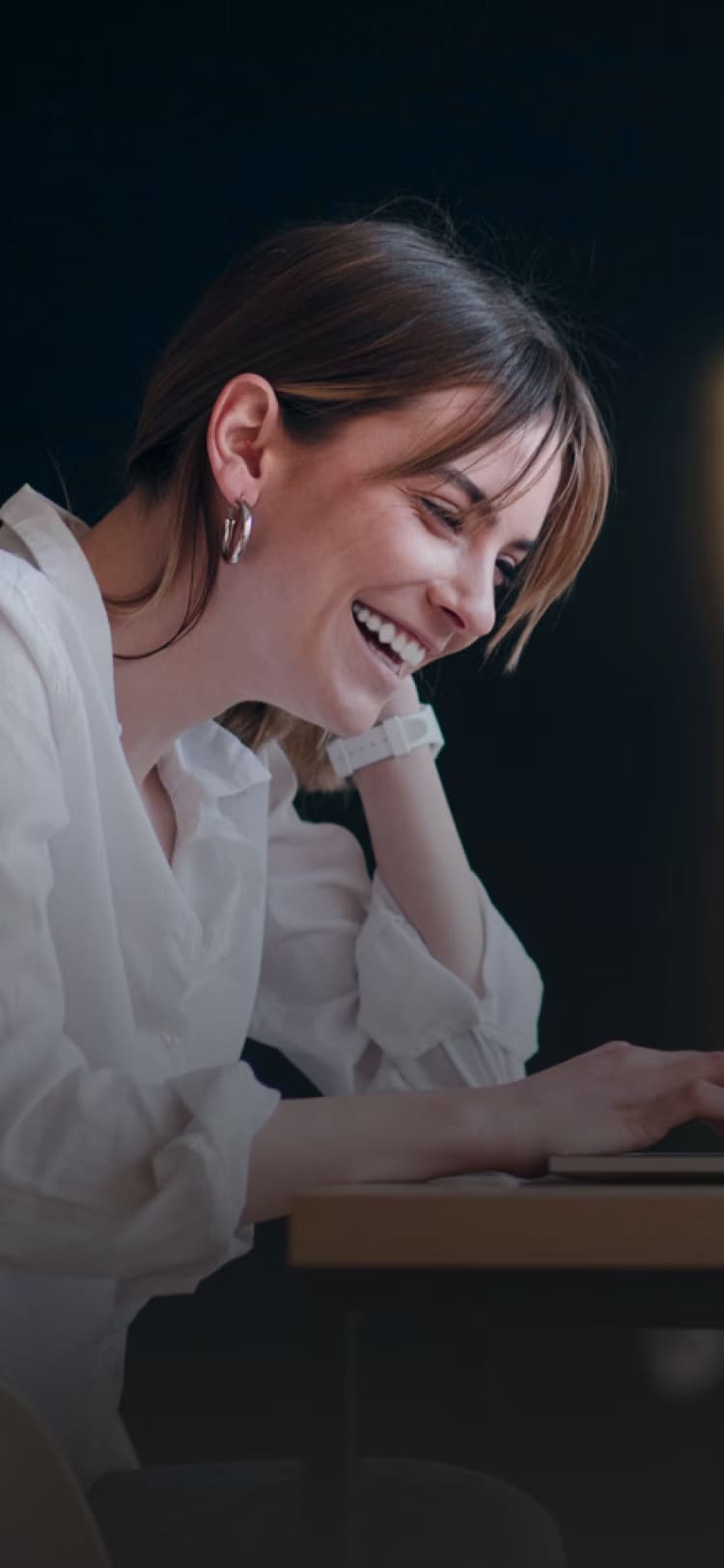 Woman with Laptop- FXPay | OrthoFX