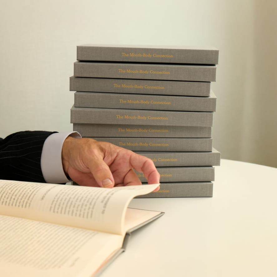 greyscale of books stacked on eachother