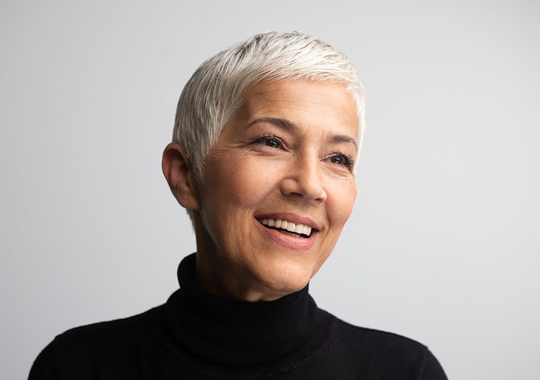 older woman with very short grey hair