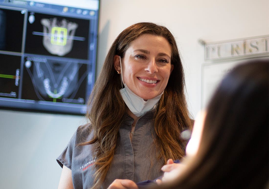 female dentist smiling