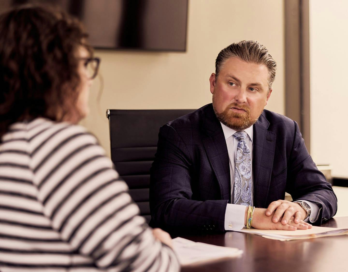 attorney talking to woman