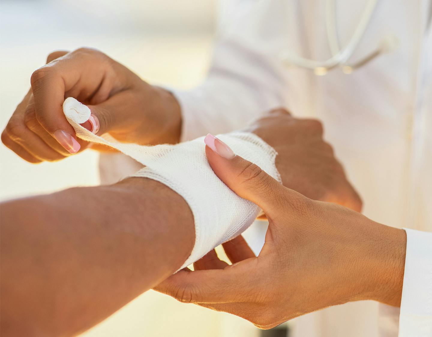dog biting a man's arm