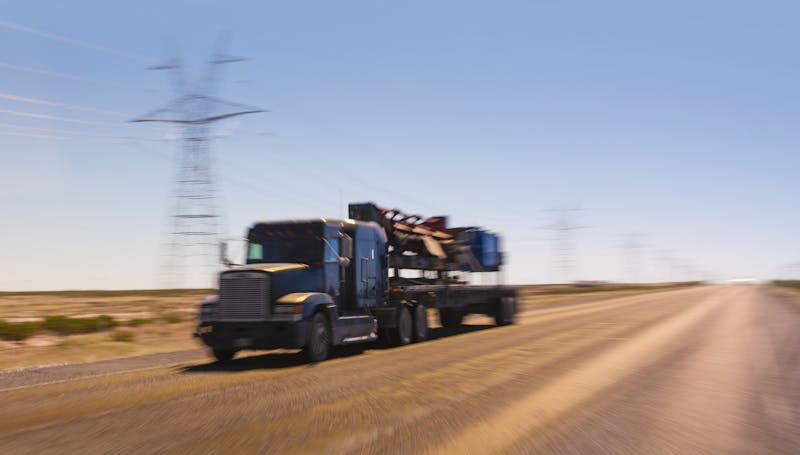 semi truck driving on a highway