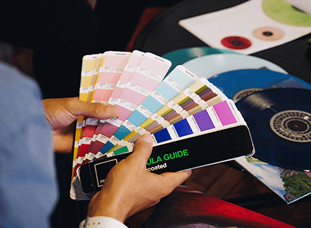 A pantone swatch book fanned open