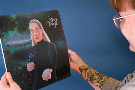 PRPTorresLoop.gif Becca holding Torres – Silver Tongue record jacket