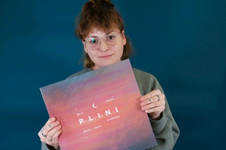 PRPPliniLoop2.gif Becca holding Plini - Singles record jacket and vinyl
