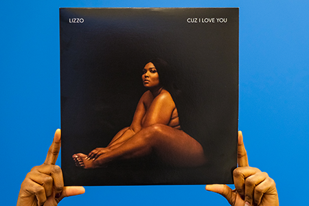 CandiceSelection.png Hands holding Lizzo - Cuz I Love You vinyl record