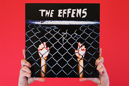 Hands holding The Effens vinyl record