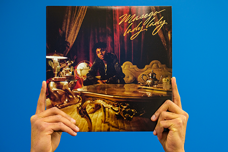 Hands holding Masego - Lady Lady vinyl record