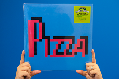 Hands holding Nickelodeon / Konami – Teenage Mutant Ninja Turtles: Turtles in Time vinyl record