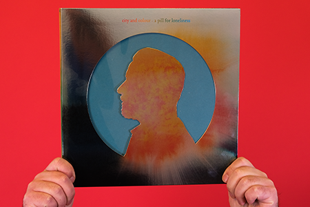 Hands holding City and Colour - A Pill For Loneliness vinyl record