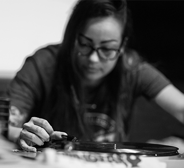 Jenn D'Eugenio operating a turntable