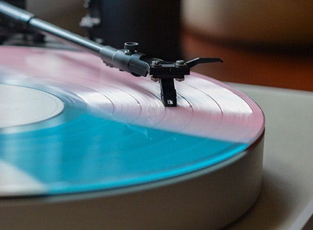 Turntable tonearm on a vinyl record
