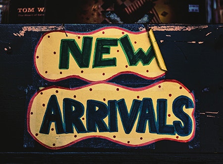 New arrivals sticker in record store
