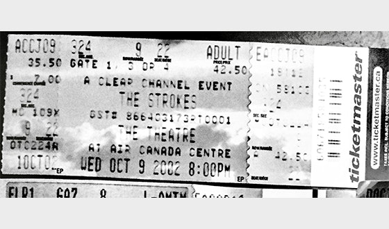 Black and white photo of The Strokes concert ticket
