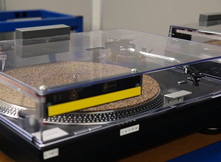 Turntable use in Audio quality assurance department at Precision Records Pressing, Burlington, Ontario