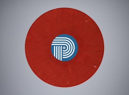 Red vinyl record made from recycled compound