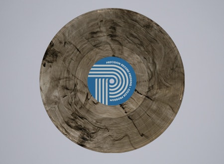 Espresso-colored vinyl LP from PRP's Flavor Color Variant Collection: Rich dark brown hue with unique pressing details.