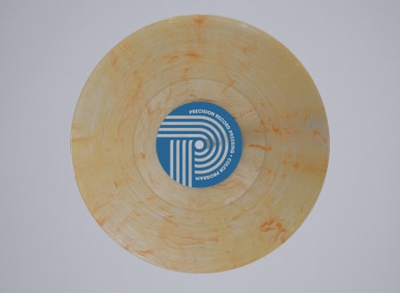 orange-colored vinyl LP from PRP's Flavor Color Variant Collection: Light orange hues with unique pressing details.