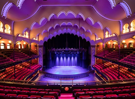 MH_Interior_Simon_Tanenbaum.jpg Interior view of concert hall: Rows of seats facing a stage with ambiant lighting