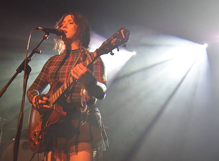 Ruby Waters performing onstage.