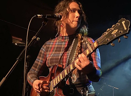 Ruby Waters performing onstage.
