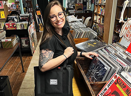 Jenn looking through records.