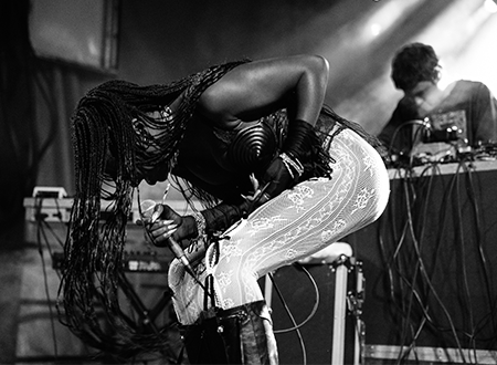 Debby Friday performing onstage.